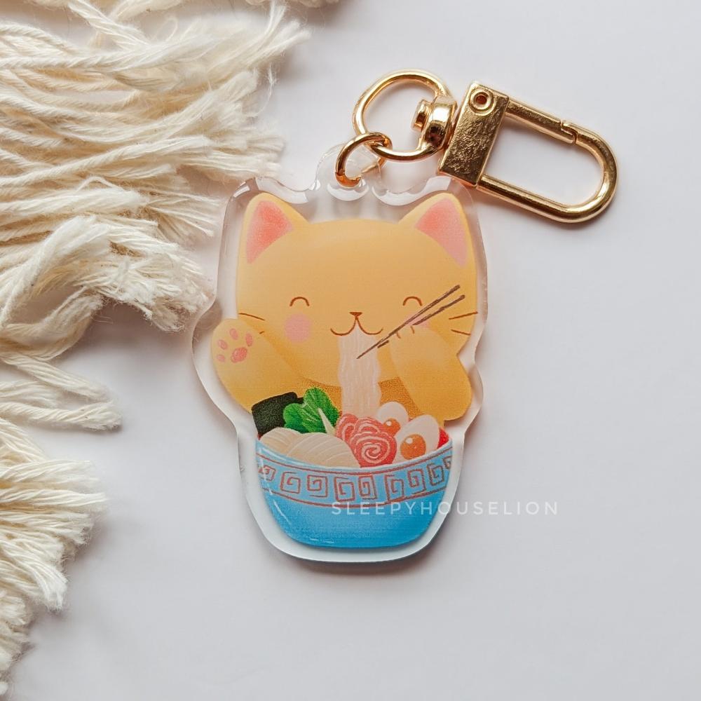 Cat Eating Ramen Keychain - Sleepy House Lion