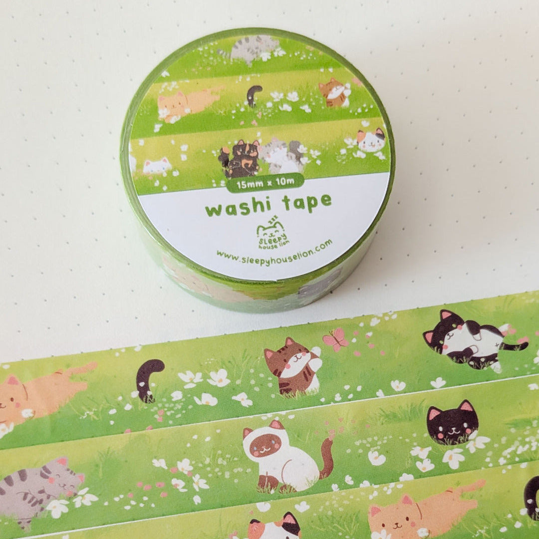 Washi tape with cat designs on a white background