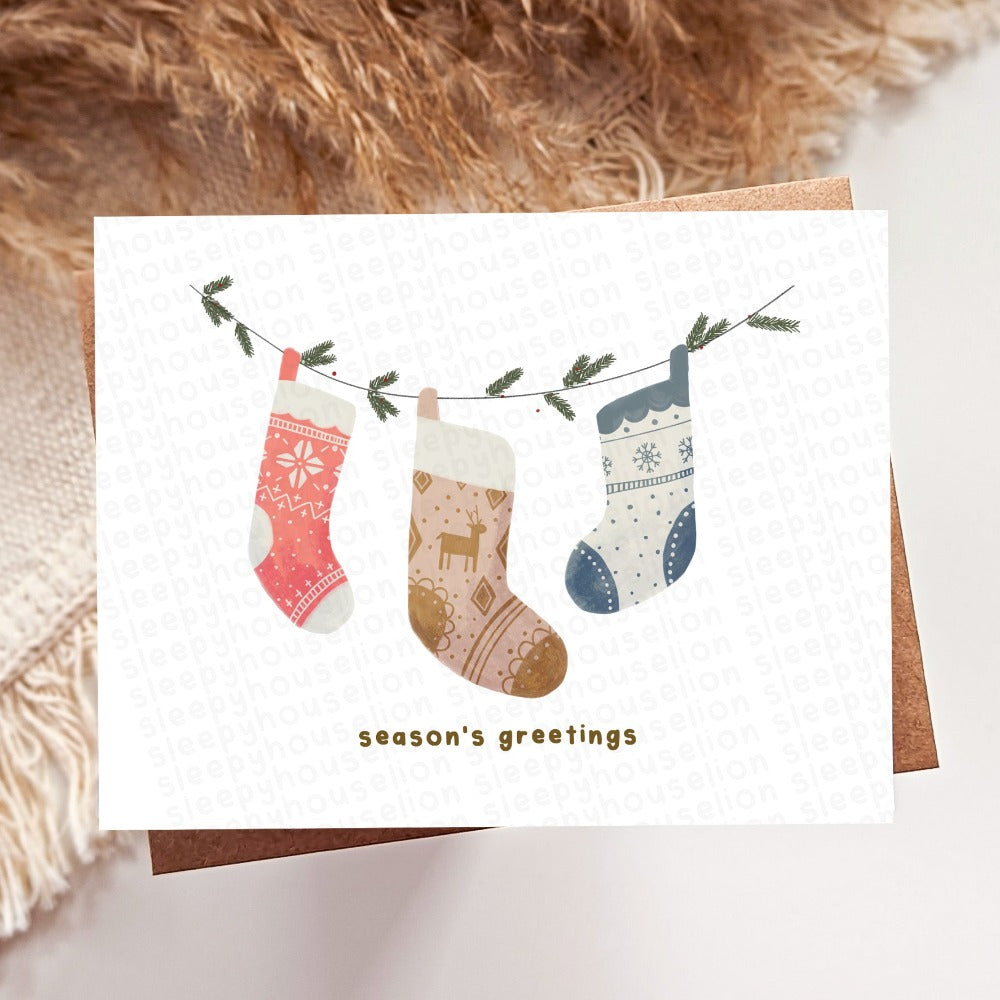 COZY SEASONAL STOCKINGS GREETING CARD