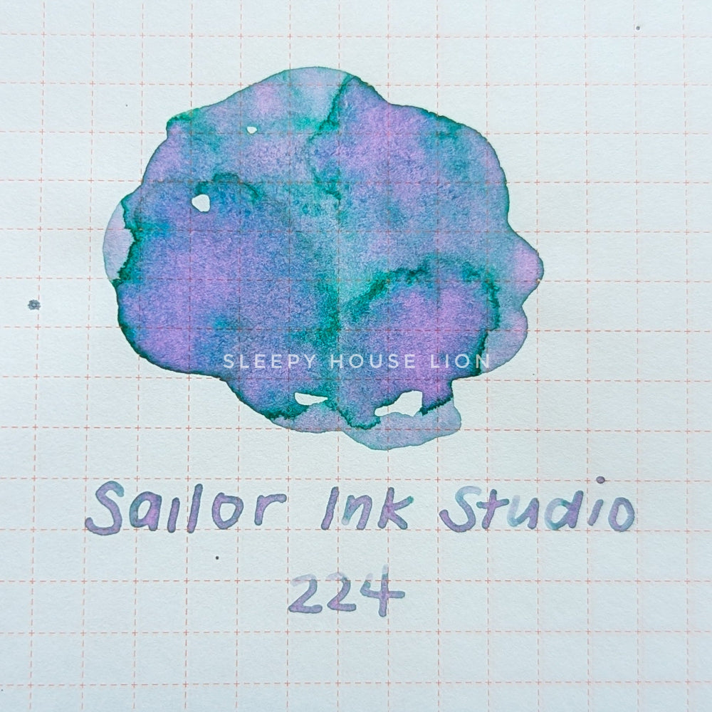 purple and green sailor ink studio 224 fountain pen ink swatch on tomoe river paper.