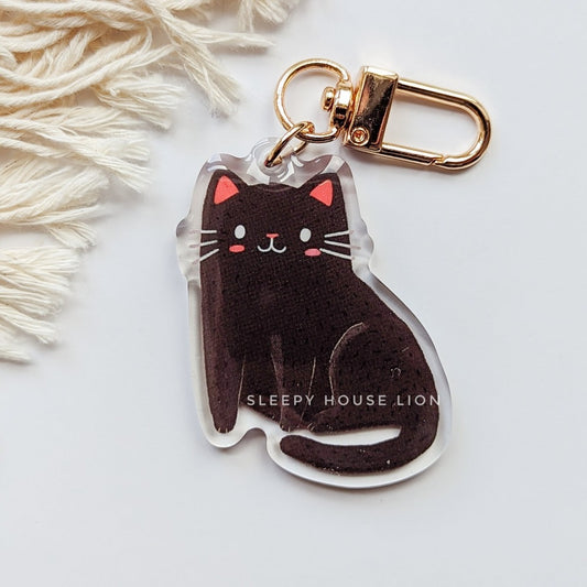 black cat acrylic keychain