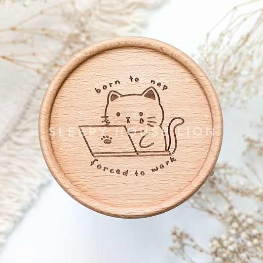 wooden engraved coaster with cat crying on laptop with text: born to nap forced to work