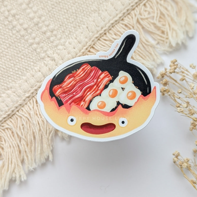 flame cooking bacon and eggs on frying pan vinyl sticker