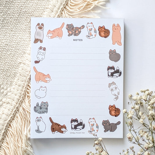 A2 sized notepad with cute cats along the border
