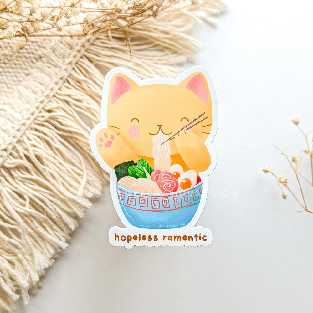 yellow cat eating ramen with quote: hopeless ramentic