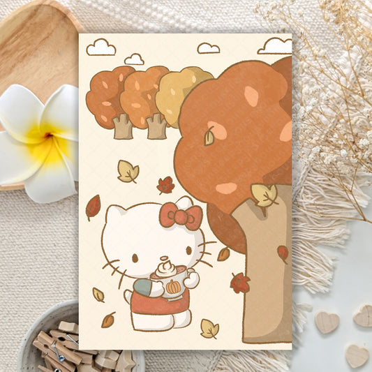 Cartoon cat character with autumn theme on a decorative card