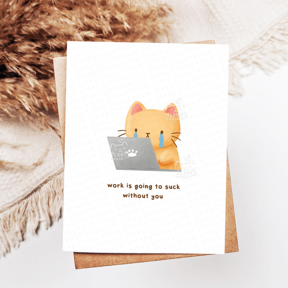Greeting card with a cat illustration and text "Work Is Going to Suck without You" on a textured surface